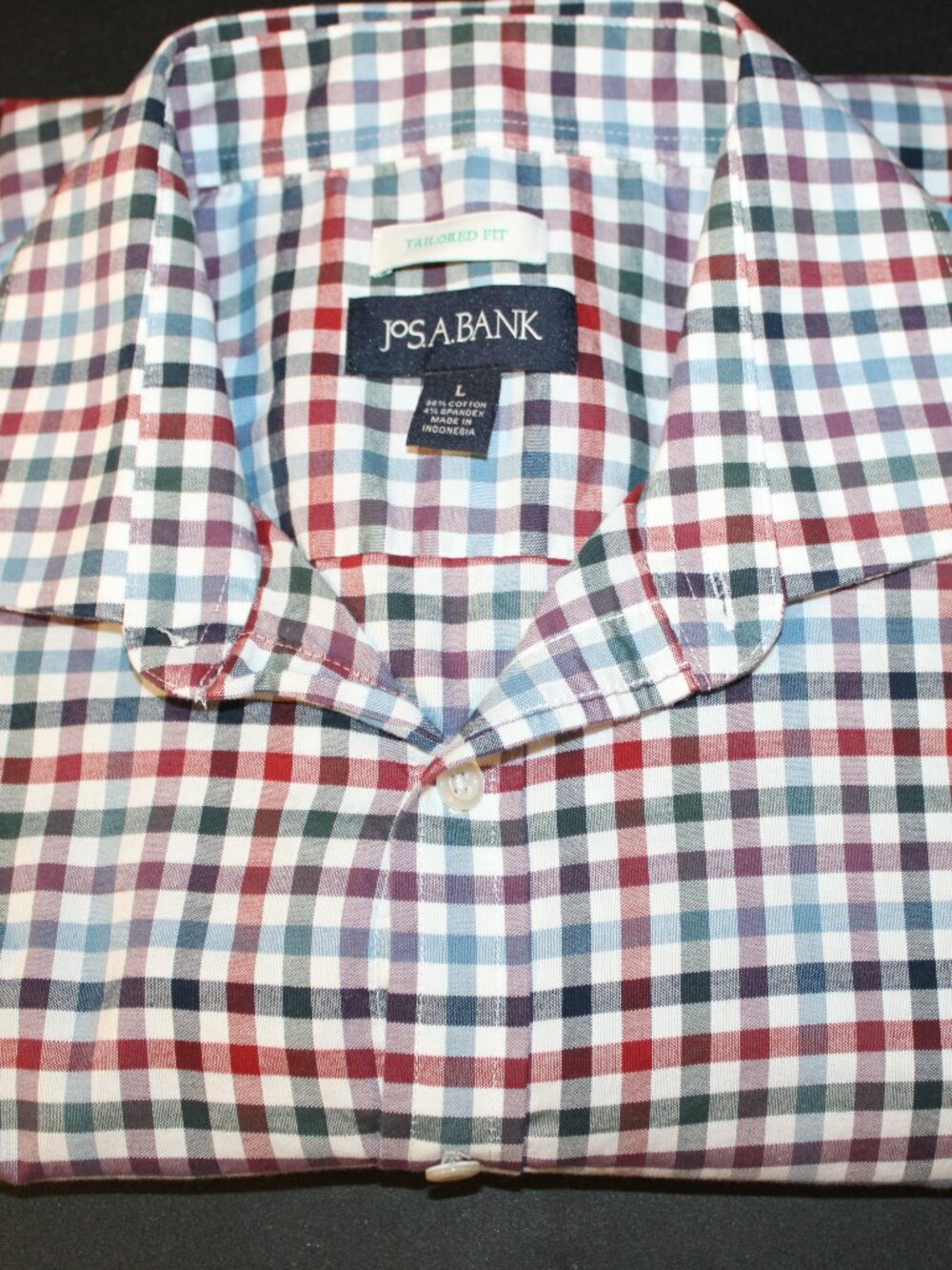 JoS .A. bank tailored fit Long sleeve dress shirt size L 86% Cotton 4% Spandex